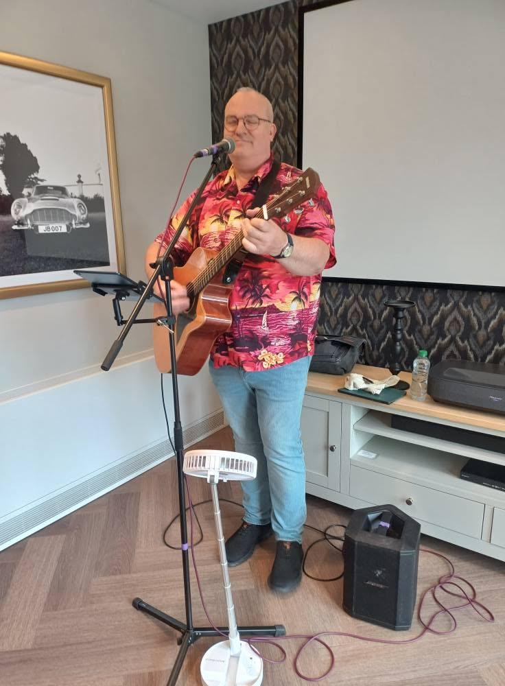 singer-with-guitar-performing