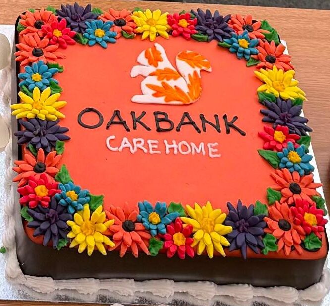 cake with Oakbank branding it at party